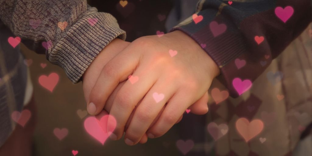 Casal de mãos dadas, corações coloridos, amor.